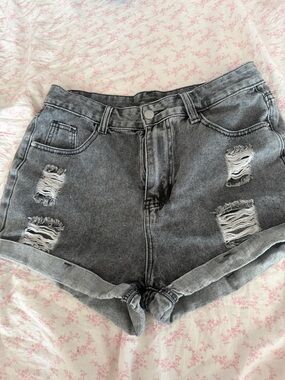 High-Rise Distressed Denim Shorts in Washed Black